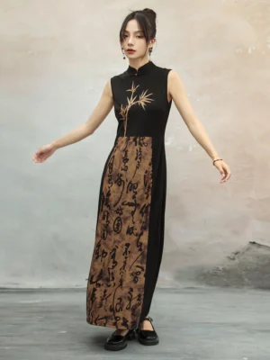 Front view of a traditional Chinese inspired sleeveless cheongsam dress featuring a black bodice, brown calligraphy print panel, golden bamboo chest motif, and elegant stand collar