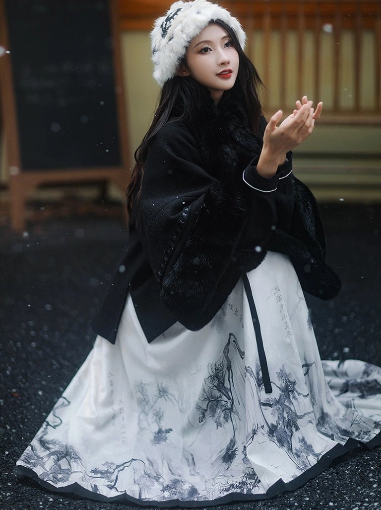 Side sitting view of a modern Chinese hanfu and mamianqun outfit with monochrome ink landscape print, styled with a white beret against a wooden storefront