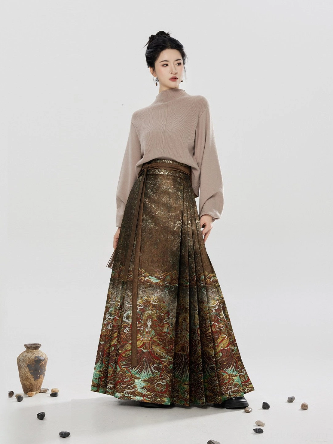 Back view of a modern Chinese hanfu fusion outfit showing the flowing pleated structure of the printed mamianqun skirt