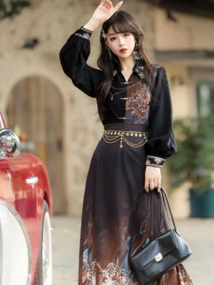 Modern Chinese Hanfu outfit with pleated black sleeves, floral chest design, printed mamianqun skirt, vintage tassel earrings, and decorative waist chain