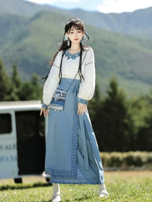 Front view of modern Chinese style Hanfu ethnic vest top and wrap skirt outfit with geometric embroidery, braided hair, white socks, and matching bag