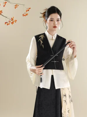 Close-up front view of a modern Chinese style hanfu vest with golden bamboo embroidery frog buttons tassel pendant and matching skirt panel