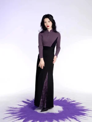 Modern Chinese style outfit featuring a dark purple ribbed stand collar knit top and high waist black skirt with purple pleated side slits