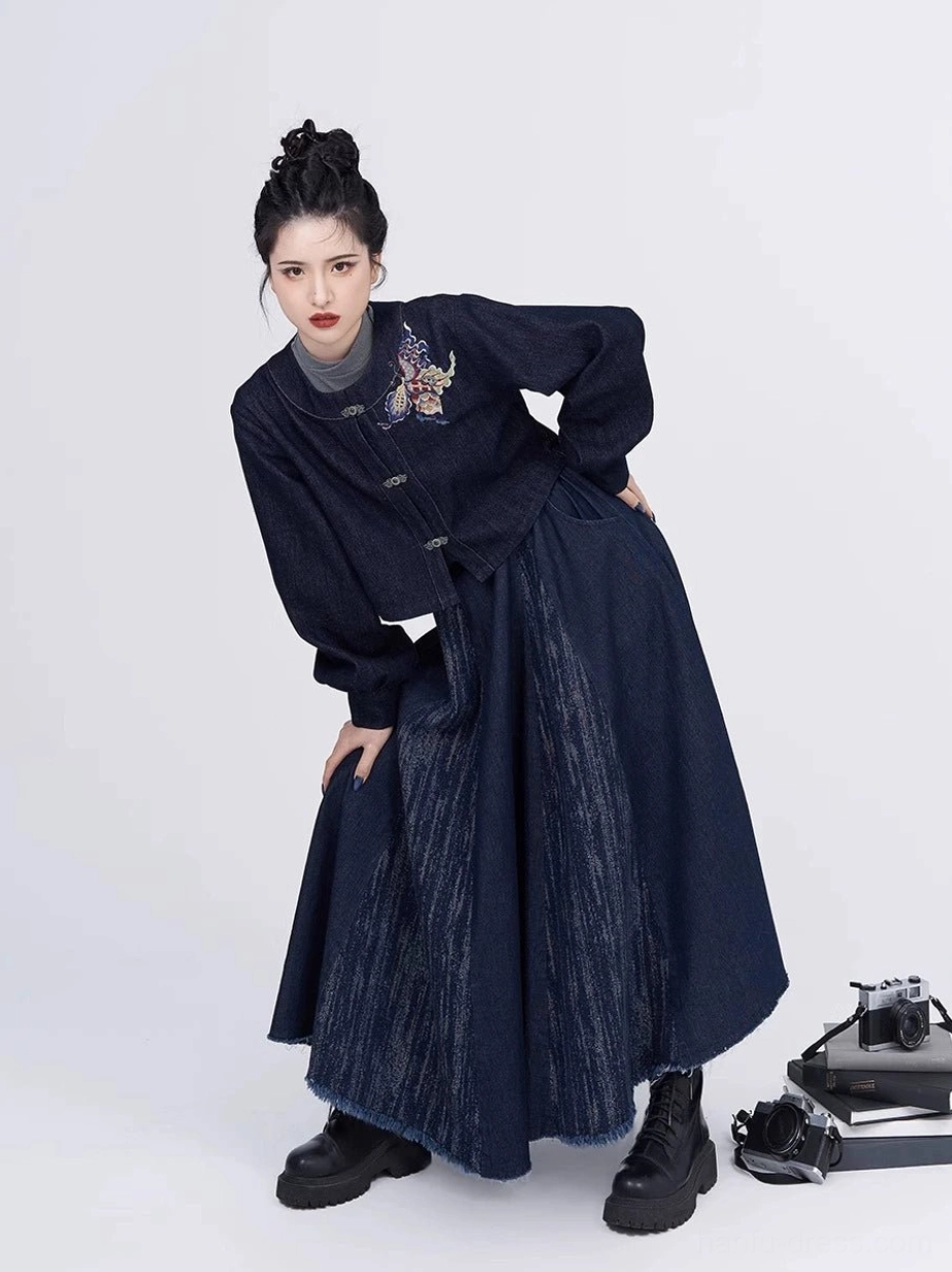 Modern denim Tang Dynasty Hanfu full set with embroidered cropped jacket and high-waisted eight-panel skirt worn in a three-quarter front view