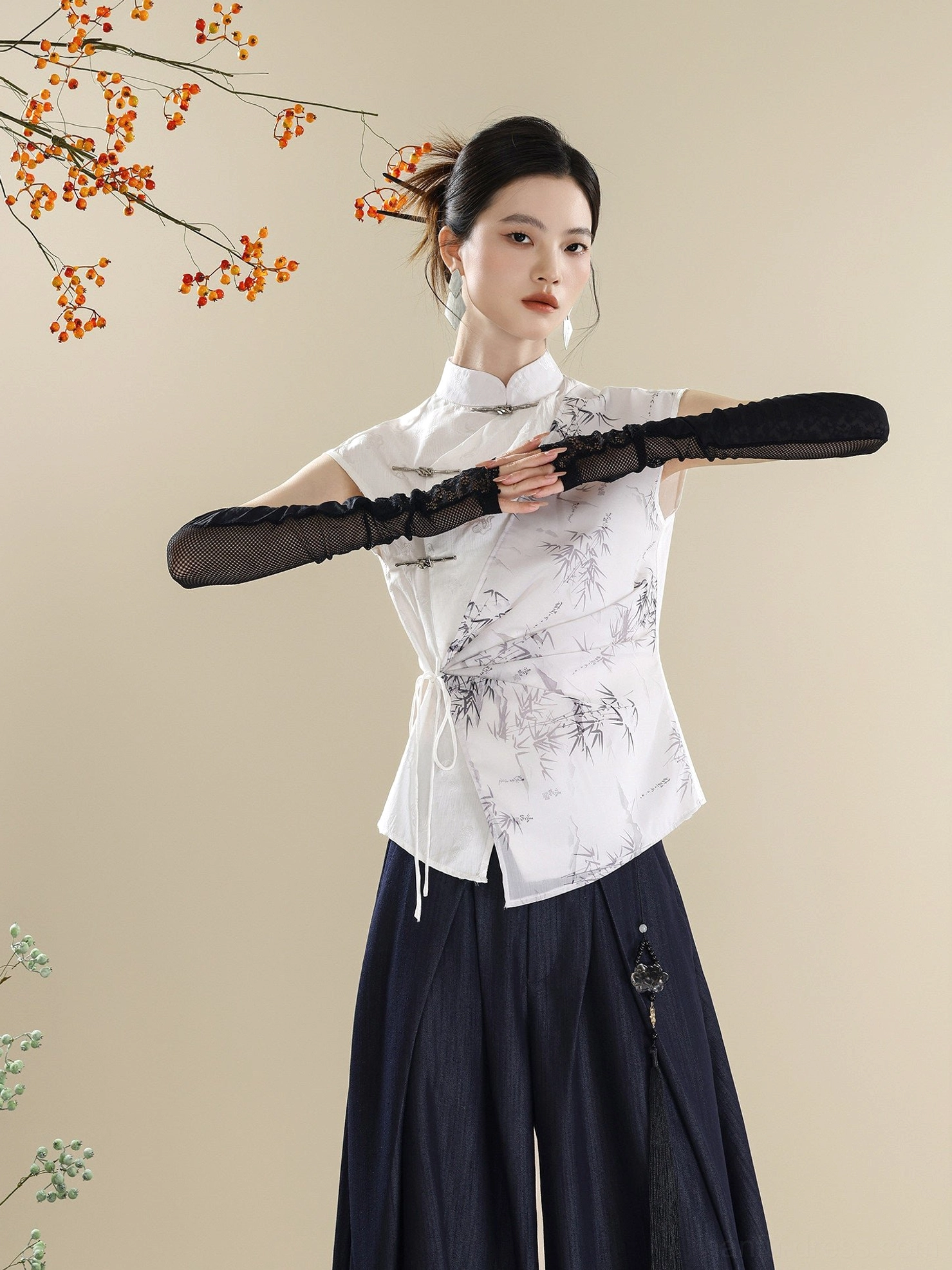 Modern Hanfu asymmetric wrap style Mandarin collar bamboo top and navy lantern pants with tassel detail