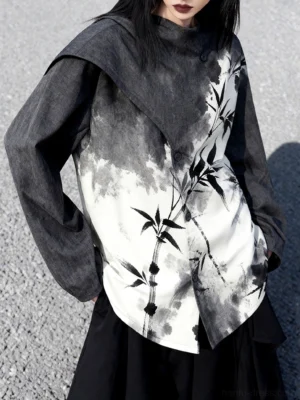 Close up front view of modern Hanfu bamboo print top with asymmetrical shawl collar button front and dark grey to off-white gradient fabric