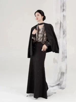 Modern Hanfu three-piece formal suit with black tailored blazer, watercolor blouse and gold-fleck mermaid skirt front view