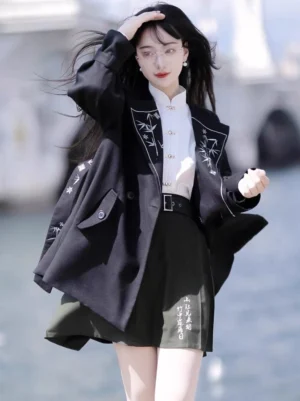 Back three-quarter view of a modern Hanfu black fleece coat with bamboo embroidery double-breasted styling and matching traditional-inspired outfit