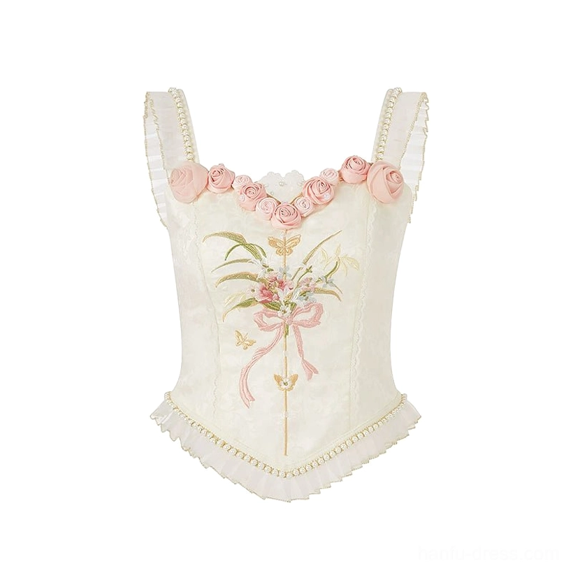 Flat lay of the cream modern Hanfu bustier featuring a three dimensional pink rose neckline, floral ribbon embroidery, and pearl trim
