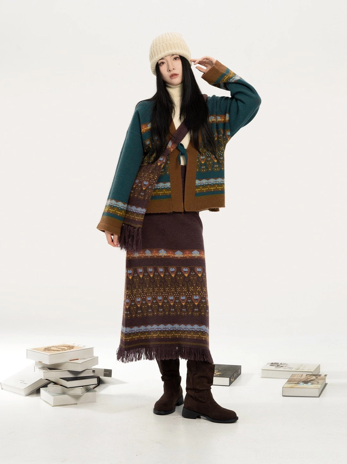 Modern Hanfu cardigan and fringed midi skirt styled with a matching jacquard knit crossbody bag