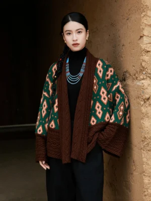 Modern Hanfu contrast color wool knit cardigan jacket styled with a black turtleneck and wide-leg pants in an earthy outdoor setting