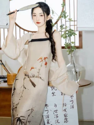 Half body view of modern Hanfu dress set with flowing sheer cardigan, ink painting print, and traditional Chinese silk fan