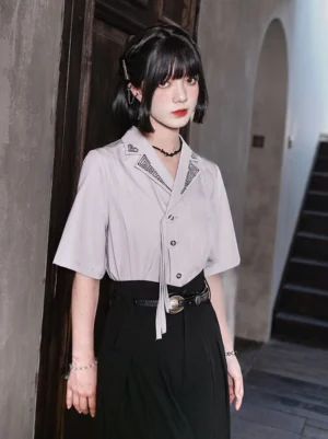 Modern Hanfu embroidered short sleeve shirt in light gray with geometric lapel embroidery, removable front neck tie, and black belted pleated skirt styling