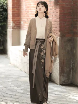Modern Hanfu fall outfit with diamond-knit taupe cardigan maple embroidery long brown skirt and matching knit scarf