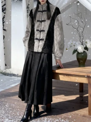 Three-quarter front view of a Chinese-style faux rabbit fur jacket showing the vertical frog-button closure, plush grey fur trim, and black two-tone fabric panels