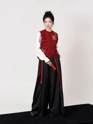 Modern Hanfu gold-thread embroidered wine-red vest with white stand-collar top and black wide-leg pants full outfit front view