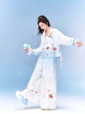 Modern Hanfu goldfish print hooded jacket and wide-leg pants full set shown in a left three-quarter view with blue to white gradient fabric