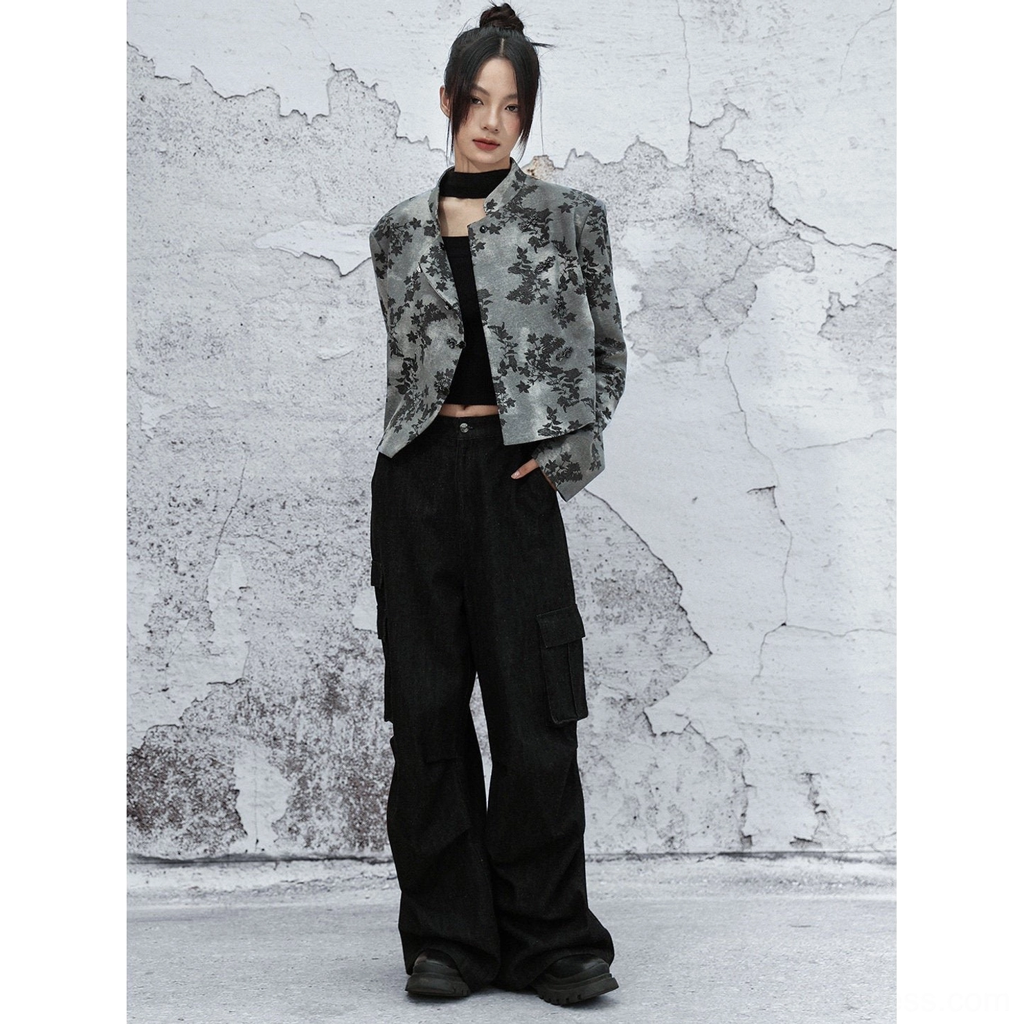 Full-body front view of grey floral print Modern Hanfu cropped stand collar jacket styled with black turtleneck and wide-leg cargo pants