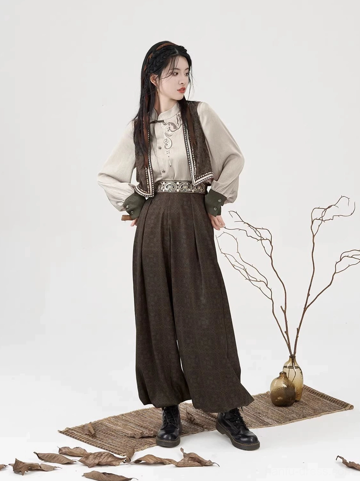 Modern Hanfu full outfit showing high-waisted wide-leg lantern pants, embroidered waistband, and layered vest styling