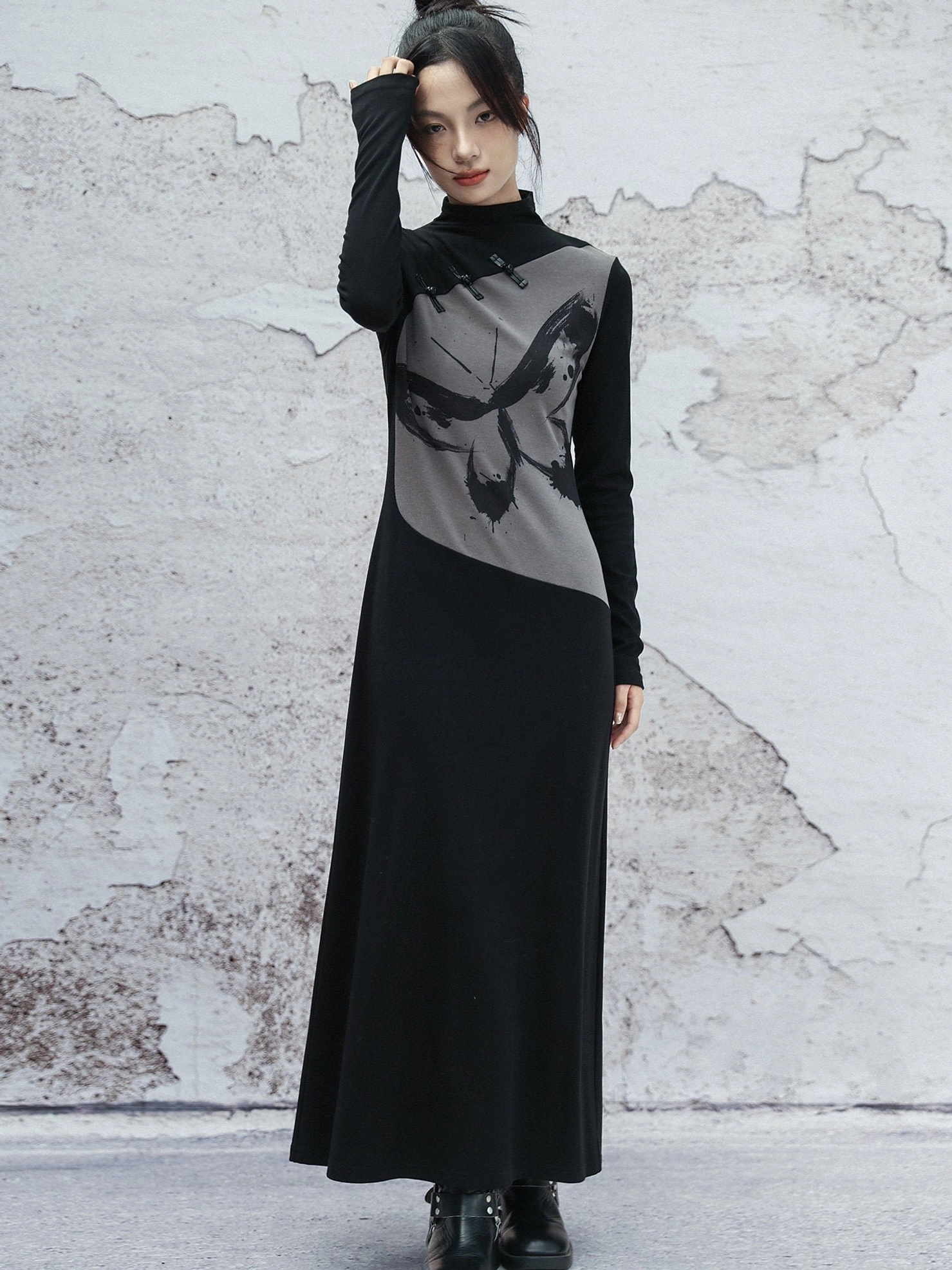 Modern Hanfu cheongsam inspired ink butterfly maxi dress three quarter front view showing asymmetrical grey printed panel and mock neck
