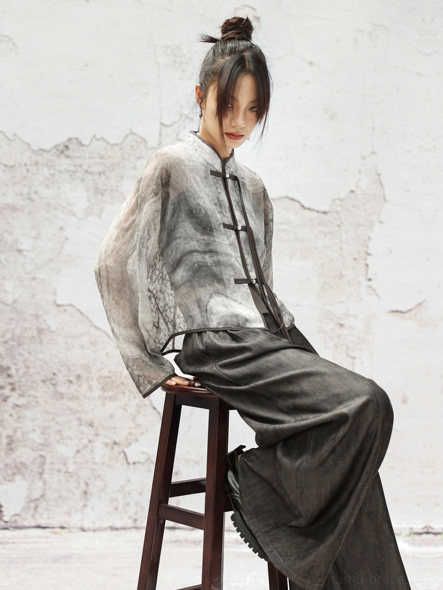 Modern Hanfu ink-wash print cropped jacket with Mandarin collar, dark frog buttons, sheer graphite fabric, styled with wide-leg trousers