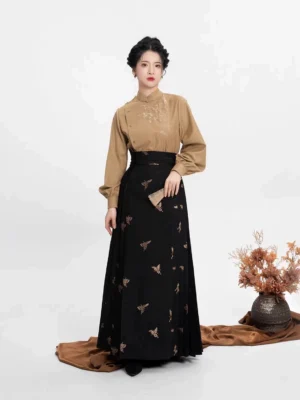 Front view of modern Hanfu embroidered top and maxi skirt with khaki stand collar top and golden pine and butterfly embroidery