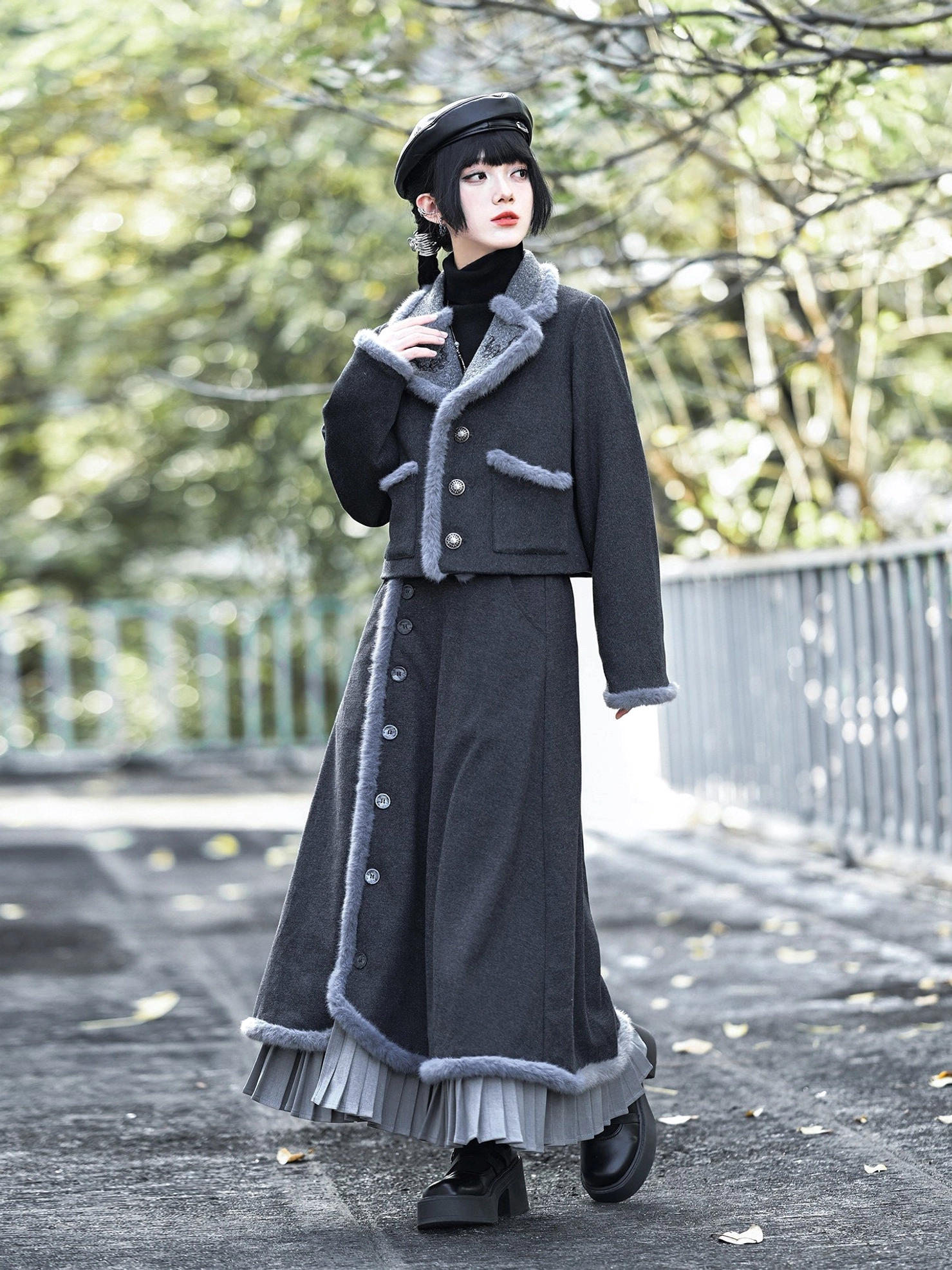 Side three-quarter view of modern Hanfu lucky bat embroidered wool jacket showing silver buttons, cropped cut, textured trim and coordinated vintage skirt