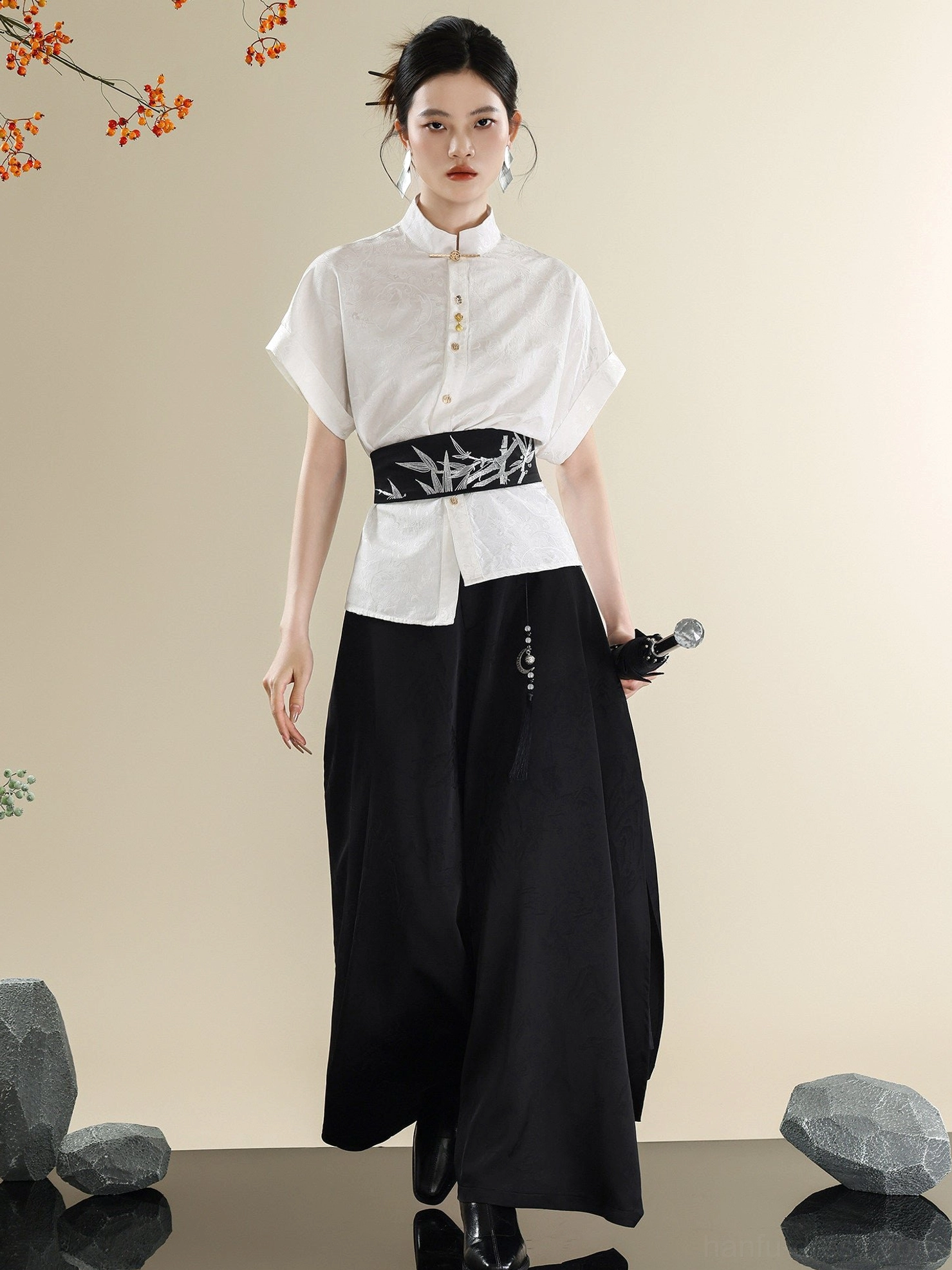 Full front view of a modern Hanfu outfit with white Mandarin collar shirt, black bamboo embroidered waist sash, and flowing black wide-leg trousers