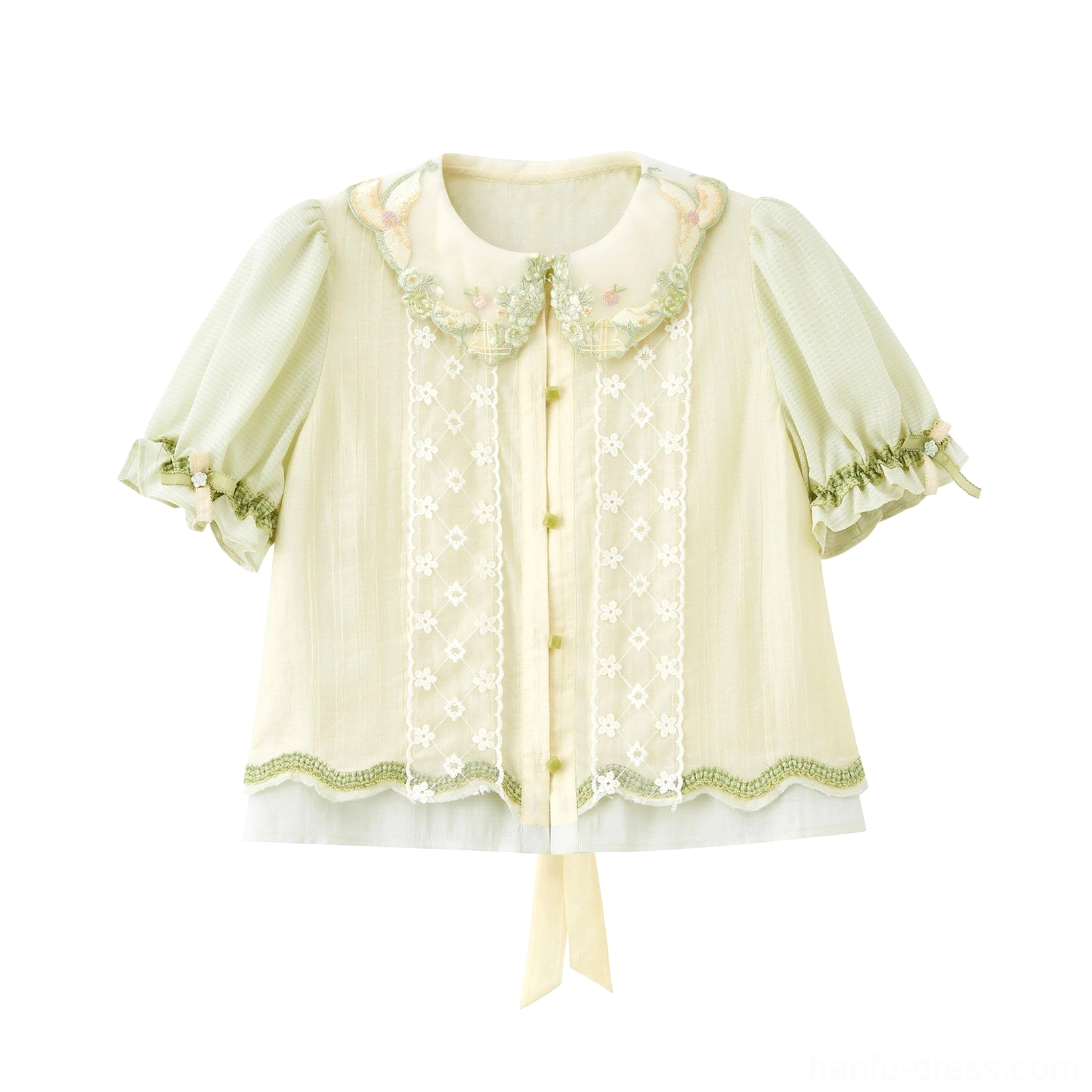 Flat lay display of a light apricot-green modern Hanfu short sleeve blouse with puffed ruffled sleeves, lace front panel, floral doll collar, and back waist tie
