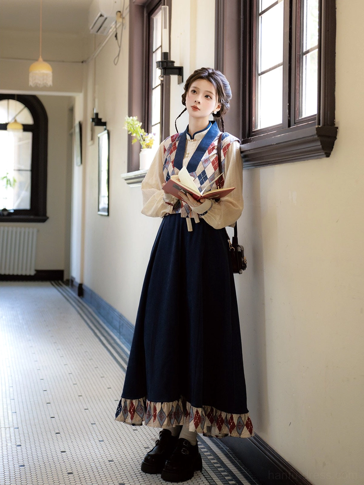 Vintage inspired modern Hanfu daily wear set with a neat stand collar top and tailored dark blue A line skirt in a retro residential corridor
