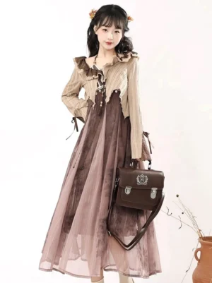 Three-quarter side view of a vintage modern Hanfu two-piece dress with asymmetrical cropped cardigan sleeve details and flowing full-length skirt