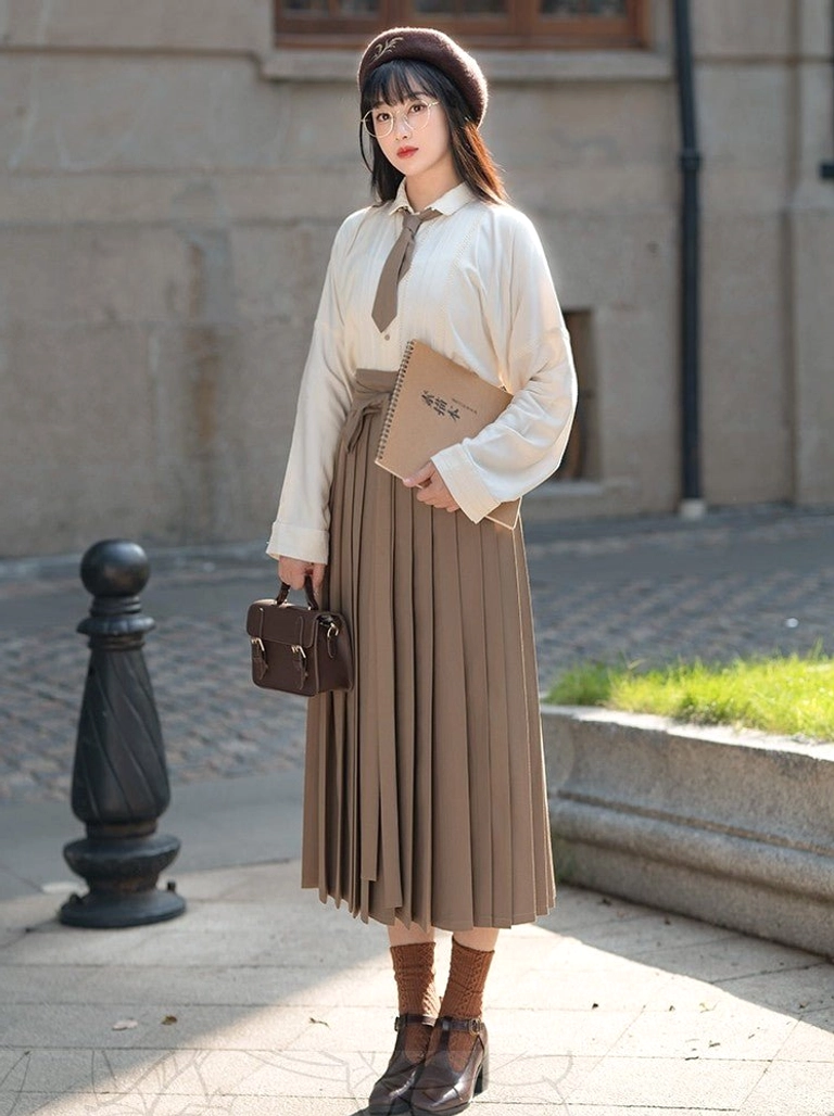Full length modern Ming Dynasty Hanfu inspired outfit with beige pintuck shirt and high waisted pleated midi skirt