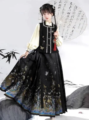 Three-piece modern Ming Dynasty Hanfu set with black embroidered vest, ivory lantern sleeve blouse, and black mamianqun horse face skirt with golden butterfly motifs