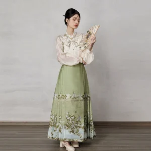 Modern Ming Dynasty Hanfu outfit with embroidered cloud collar sheer bishop sleeve blouse green floral mamianqun horse face skirt and folding fan
