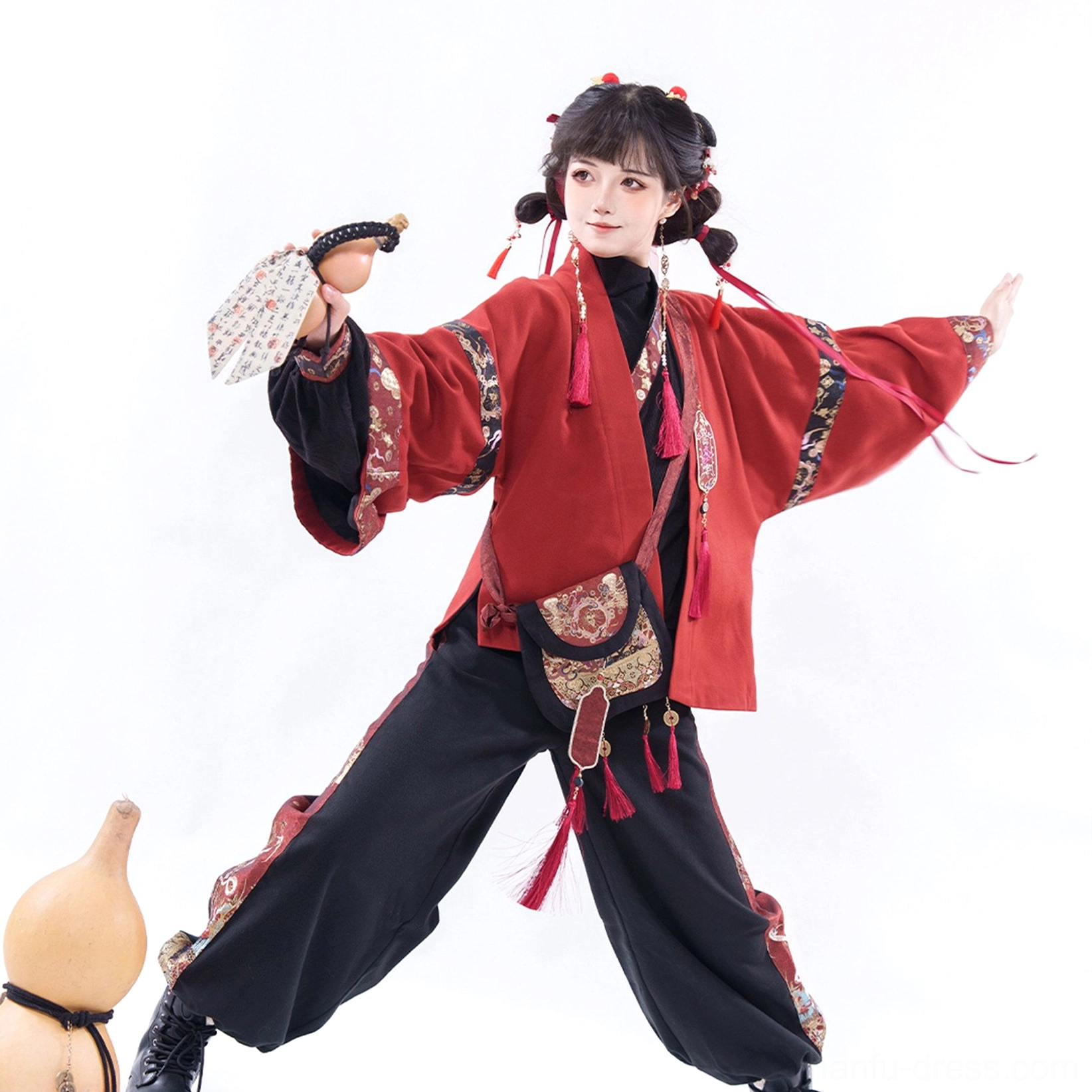 Modern Ming-inspired Chinese New Year Hanfu set with red tassel crossbody bag, layered jacket, and traditional hair accessories