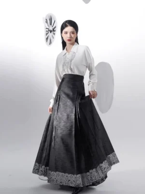 Front view of a modern Ming style mamianqun hanfu set with black pleated horse face skirt silver embroidered blouse collar and elegant Chinese traditional styling