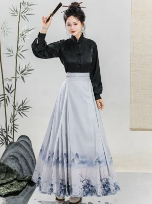 Modern Ming-style Hanfu outfit featuring a black long-sleeve stand collar top and light gray blue landscape print mamianqun skirt with folding fan