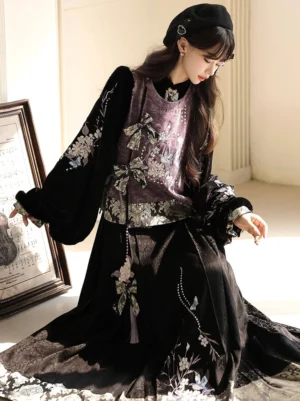 Modern Ming-style hanfu set with dusty purple embroidered vest, black floral top, and flowing black mamianqun horse face skirt shown in a vintage indoor studio