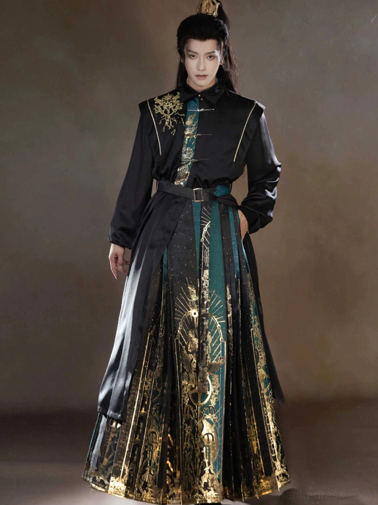 Front view of a modern Sanxingdui Hanfu top with black stand collar, gold shoulder embroidery, matching horse face skirt, and green waist belt