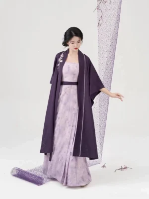 Full-body front view of a woman wearing a modern Song Dynasty Hanfu set with a dark purple Beizi jacket and floral pleated slip dress