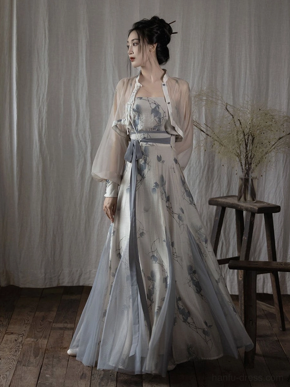 Modern Song Dynasty Hanfu blue floral pleated skirt set shown in three-quarter side view with long flowing outer jacket