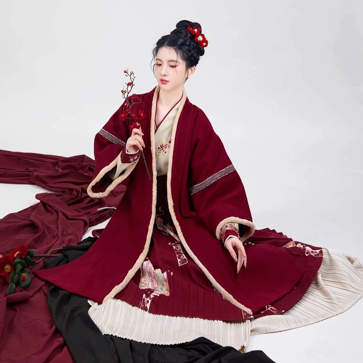 Modern Song Dynasty hanfu Chinese New Year outfit with festive red styling, floral details, wide sleeves, and flowing layered skirt