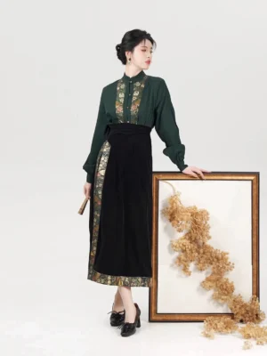 Modern Song Dynasty Hanfu full set in dark green embroidered long sleeve top and black velvet high waisted skirt three quarter view