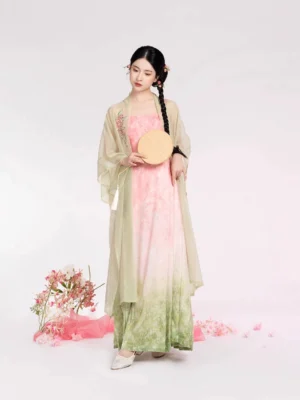 Full-body front view of modern Song Dynasty Hanfu with a light green translucent beizi jacket, peach-to-willow gradient dress, and white Hanfu shoes