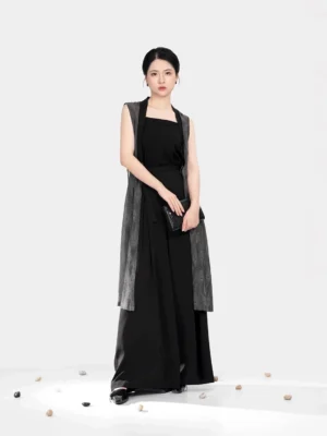 Full-body front view of a modern Song Dynasty Hanfu long sleeveless bijia vest in dark grey sheer textured fabric