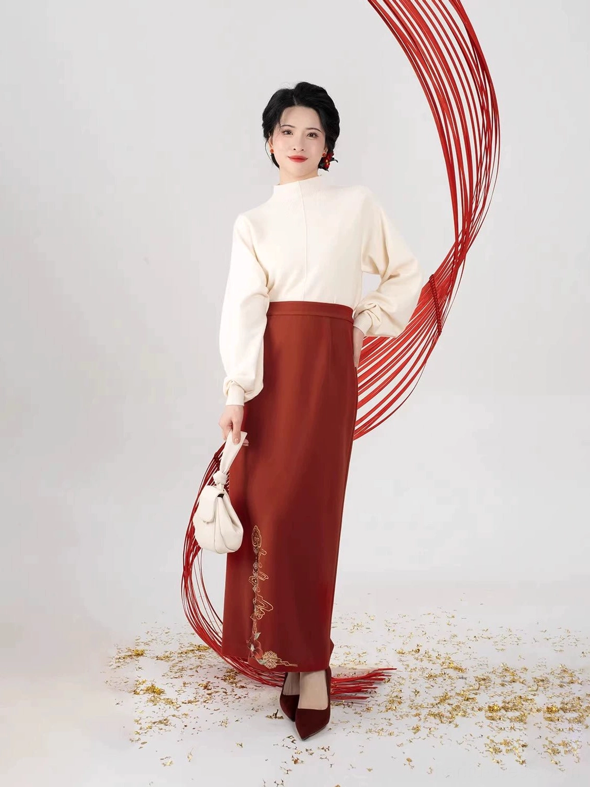 Side view of a modern Song Dynasty Hanfu outfit with off-white inner top and high-waisted burgundy skirt featuring golden floral embroidery