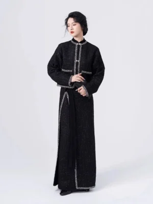 Front view of a modern Song Dynasty Hanfu two-piece set with black cropped mandarin collar jacket, silver piping, and long wrap skirt