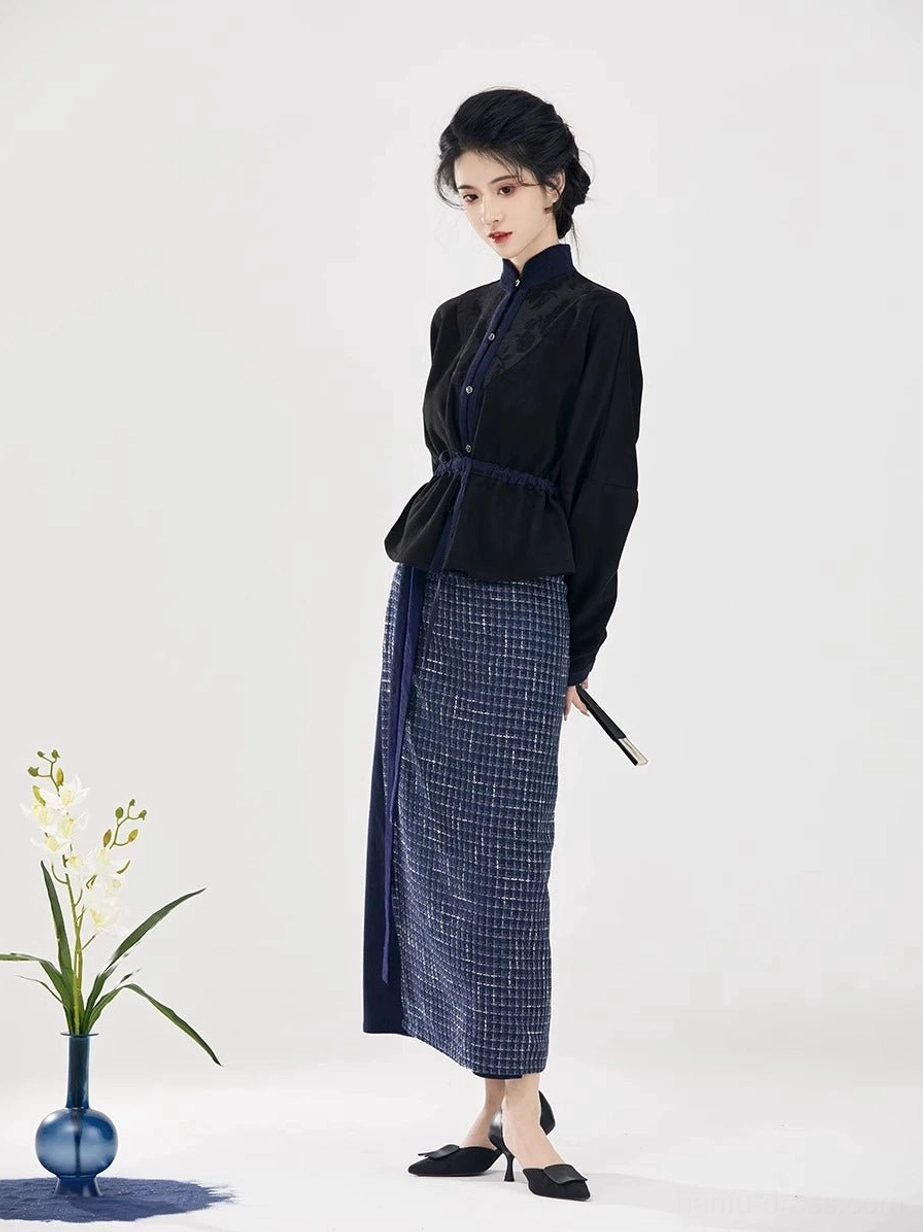 Rear side view of modern Song Dynasty hanfu set showing navy drawstring waist sash and plaid wrap skirt