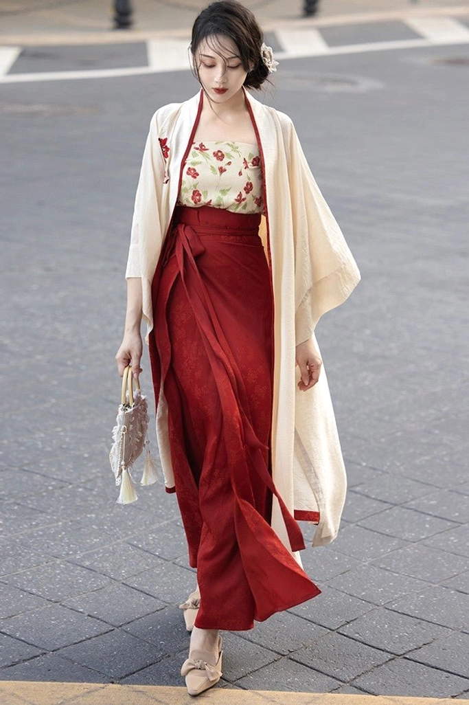 Full-body modern Song Dynasty Hanfu three-piece set styled for graceful daily wear with floral camisole, beige jacket, wine-red skirt, and handbag