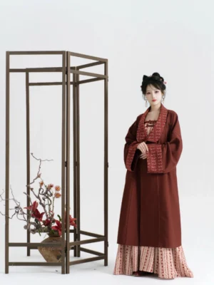 Full-length front view of a modern Tang Dynasty Hanfu outfit with an open burgundy coat and floor-length striped dress